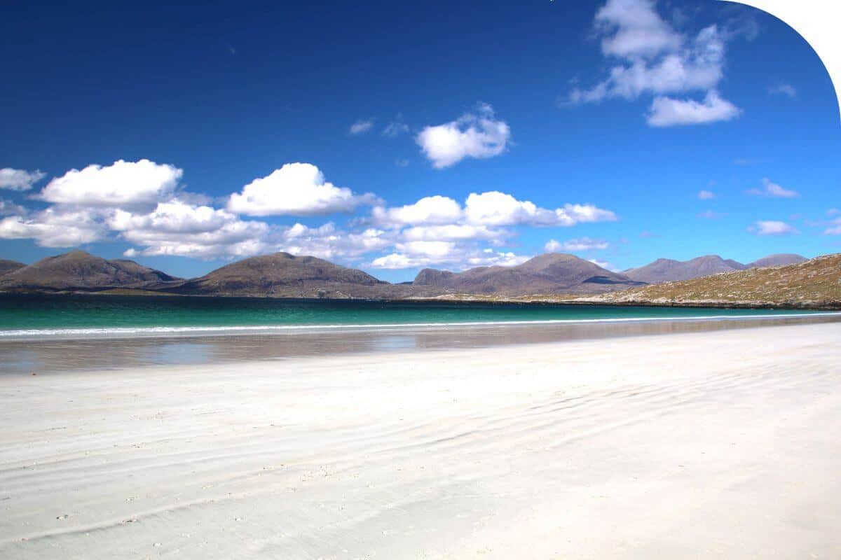 Luskentyre beach, Scotland, UK | Scotland Less Explored is stunning white beach in Isle of Harris and a white travel destination for your bucket list