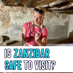 is Zanzibar safe to visit is part of tanzania travel guide and zanzibar guide wit Anja holding slave chains of former slave market